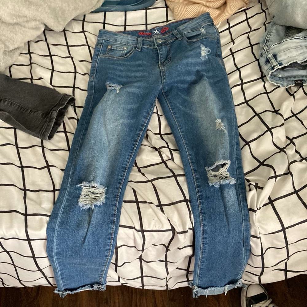 Blue ripped jeans